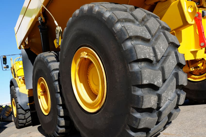 Large off the road tyre on a yellow rim